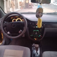 اوبترا ٢٠١٢ سيارة نضيفة تجي وشوف بعينك بيها باب الخلفي وجاملغ امامي مب...