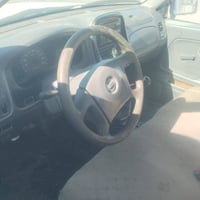 مكينة ٢٤٠٠ • ٢٠٠٢ • رقم بغداد