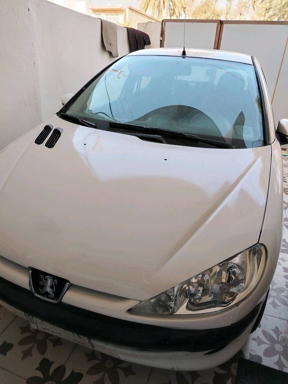 بيجو 206 موديل ٢٠٠٩ مشروع وطني رقمهه بصره باسمي من بغداد تحتاج بس ضفيره وصبغ