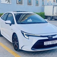 كورلا  2025  محرك 1800 هايبرد HEV رقم بغداد بسمي السيارة  ماشيه 29 الف...