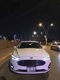 فورد فيوجن 19 لون ابيض بغداد  كلين تايتل عدا الجاملغ كلير والسونار موج...