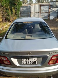 سيارة سني موديل 2003 رقم انكليزي صبغ عام أثر جراد ضربة جاملق جهة سايق ...