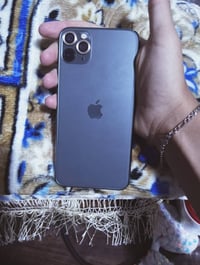 ايفون 11 pro max لون زيتوني البطاريه 94 الذاكره 256 الجهاز نظيف كلش ما...