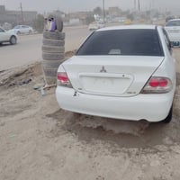 ميتسوبيشي لانسر • التفاصيل بالصور