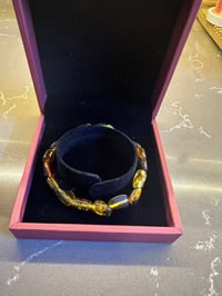 اسوارات • كهرمان طبيعي • اصليات