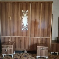 طقم غرفة نوم • خشب