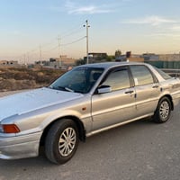 ميتسوبيشي كلنت • موديل ٨٩ • رقم بغداد