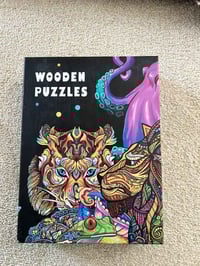 بازل خشبي • ٣ بوكسات • ١٠٠ و٥٠ قطعة