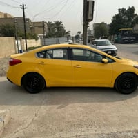 كيا فورتي موديل 2014 حادثها باب خلفي بدون دواخل السياره بجم كبس السيار...