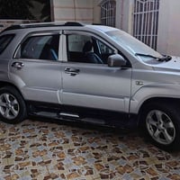 كيا سبورتج موديل ٢٠٠٩ للبيع باسمي مواصفات فتحه بالسقف وكشنات جلد ومري ...