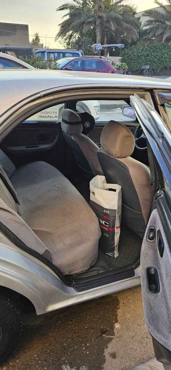 سوناتا تو 1994..... 
رقم بغداد باسمي  ….
شرط التحويل...  
(( كير اوتو ))
مكفوله من ضربه ولكص ول خياس ....
كهربائيات ع وضع شركه ولا ملعوب بيه... 
 دوشمه مدوشمه أحسن شي
ويل كب بلادي زلغ مابيه 
  ..تخم تاير.... جديد 
كهربائيات كله شغاله
ه حته ل بانزين هم يشتغل ..
نعومه ماشالله صاعد حديث 
سياره ما بيه كل عيب تخبل ول ياخذه  يرحملي من وراه 
دشبول يخبل ..
شرط لاضربه ولا طخه ولا كص و خياس  ولا كلشي وين ميعجبك روح افحص  ...
صدر خلفي أمامي كله جيد ما ملعوب بي عشركه  نعومه صاعد حديث ... بشرط ترايك 200 
غرفتها جديده ...دواخلها مثل كشنات شركه جدد ❤ ..كيجات كلها شغاله...
محرك مفتوح مو مسكر 2000 (المرغوب)
السعر خاص 
*********** مكاني واسط الصويرة
