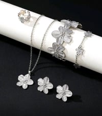 طقم زهرة • فولاذ مقاوم للصدأ • سوارين قلادة