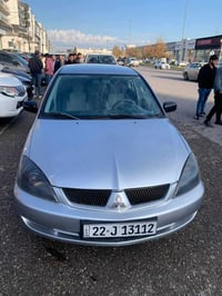 مستبوشي لانسر موديل 2008 كير ومحرك شرط 2 قطع صبغ و2 تبديل رقم جديد. با...