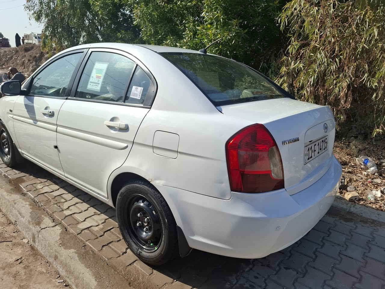 السلام عليكم اكسنت موديل ١١  خليجي مكينه ١٦٠٠ كير تبريد كهربائيات مكفولات بدون تبديل او ضربه غرفه جديده كلش اربعه جام كهرباء اشاير بلمري حساس خلفي شاشه كامره  رقم بغداد بيها قطعتين صبغ فقط عارضها ٩٣ وبيها مجال مكاني بغداد جسر ديالئ رقمي ***********
