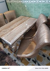 ميز مرمر • ٤ كراسي ستيل • نظيف