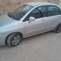 سيارة سوزوكي ليان موديل ٢٠٠٥ او تو ماتيك رقم صدامي بيه معاملة شبه الكا...