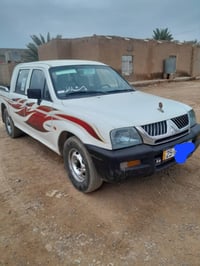 ميتسوبيشي دبل • ٢٠٠٢ • رقم كركوك