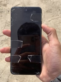 تي سي ال • ذاكرة ١٢٨ • بطارية ٥٠٠٠