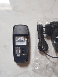 نوكيا 2600 شرط الشغل + شاحنة نقص بطارية وغطاء _15 مع التوصيل 077100169...