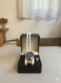 ساعة • سبحة • محبس