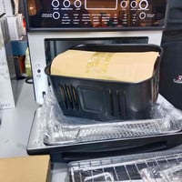 هذا المنتج هو قلاية هوائية وفرن كهربائي من ماركة هوم إلك (Homeélec)، م...