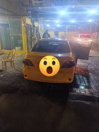 تكسي كورلا موديل 2009للبيع قطعتين جامرلغ وباب 07828314435