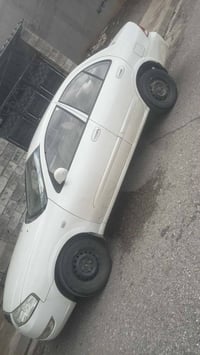 ٢٠٠٨ • ابيض صدف • بوياج ٣ قطع