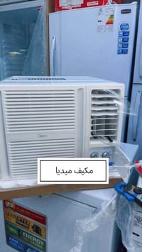 مكيف شباك يو • ٩٥٠٠ وحدة • دبل فلتر