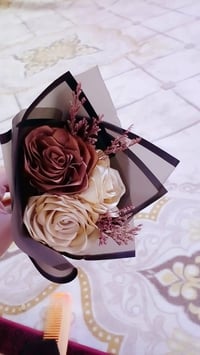 متوفر بوكيهات ورد ومسكات تخرج واعراس بأسعار مناسبه جدا للاستفسار 07727...