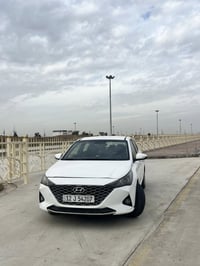 أكسنت 2022 رقم نينوي بسمي بيها قطعتين و  ب مكانين شوي صبغ بدون  دواخل....