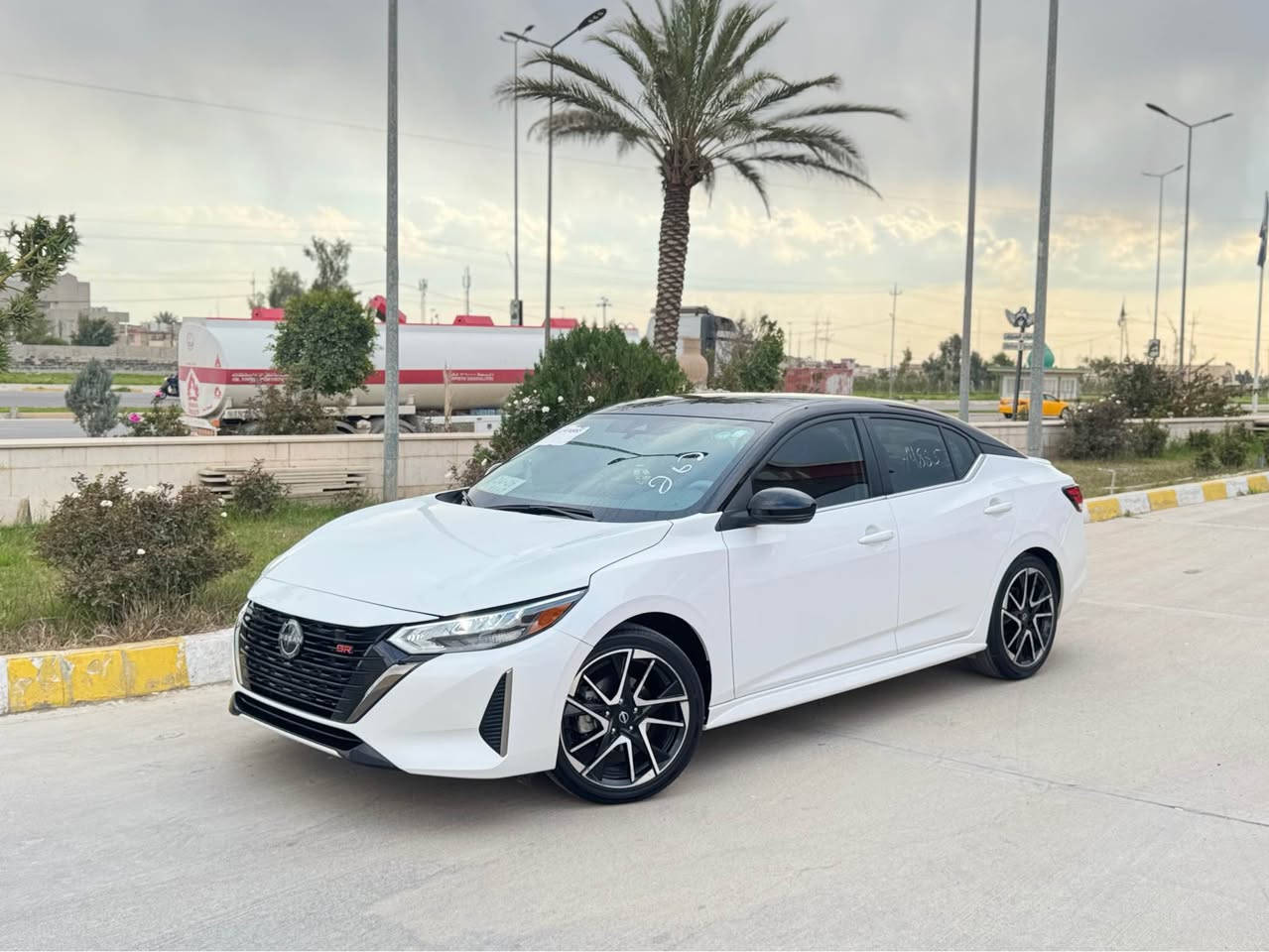 نيسان سنترا SR 2024

 • الموديل: 2024
 • الصنف: SR
 • سعة المحرك: 2000 cc
 • الوارد: أمريكي ( صبغ – البنيد -شرط بدون ارباك بلادي .بدون شاصي لغد)
 •
 • رقم السيارة: بدون رقم (تترقم محافظات شماليه فقط – كلفة الرقم على المشتري 1150 $)
 • قراءة العداد: 14,000 ميل

اللون:
 • الخارجي: ابيظ مع سقف أسود (تو كلر)
 • الداخلي: قماش أسود مخطط برتقالي

السعر: 152$
ملاحظة….سيارة بدون ارباك بدون شاصي و لغد حتي دعامية بلادية

المواصفات :
 • مصابيح أمامية زينون
 • كشافات زينون
 • تشغيل بصمة
 • بصمة أبواب
 • إطفاء تلقائي عند التوقف
 • جنوط SR (ويل كاب)
 • شاشة عرض
 • نظام Apple CarPlay
 • كاميرا خلفية
 • كاميرا أمامية (نظام مساعدة البقاء في المسار)
 • رادار أمامي
 • رادار خلفي للوقوف المفاجئ
 • حساسات للمرايا الجانبية
 • نظام تحديد المسرب
 • قيادة شبه ذاتية
 • تحكم من المقود
 • مثبت سرعة
 • بلوتوث
 • حجر بيئة بلادي
كشنات تدفء تبريد

جميع المواصفات موضحة بالصور

للاستفسار:
اتصال، واتساب 
: ***********
موقع السيارة: كركوك
*********** كركوك, العراق
