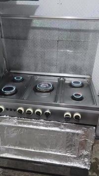 طباخ • فرن شغال • جسم خارجي مكسور