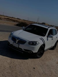 بريليانس V5 • محرك V4 مكفول • زنون عالي