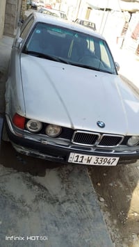عندي سياره بي ام دبليو حجم 750لون سلفر رصاصي رقم السيارة بغداد انكليزي...