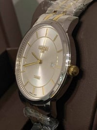 ساعة ROAMER سويسري أصلي بطارية  مكينة روندا ٥حجر  القطر ٤٠ مقاوم للماء...