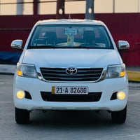 تويوتا هايلكس 2013 بيها قطعة رش  ماشية 170 ألف كم حقيقي 4 تايرات ورنجا...