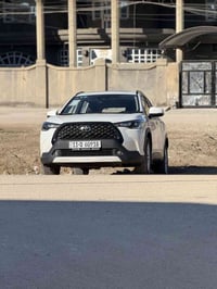 كورلا كروز موديل 25  ماشيه 18 فتحه وجلد وحمالات وكشافات رقم بغداد السع...