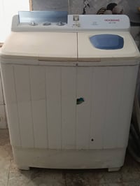 غسالة هيتاشي • النجف