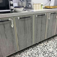 كاونتر عل شكل حرف L  قياساته السنك متر وربع والمتبقي 3امتار وربع  فقط ...