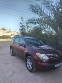 سازوكي XL7 سبعة راكب رقم بغداد بسمي السياره نضيفه كله بلادي جاهزه من ك...