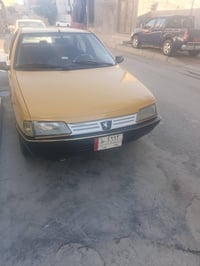 عيني من رخصت الدمن بيجو روى مديل 2009سيارة مكفولة من ضربة من المعجون و...