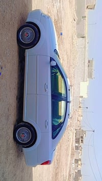 للبيع اوبترة موديل 2004 محدث موديل 2014 كلشي جديد رقم بغداد باسمي سيار...