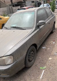 شباب كسنت موديل 2002 للبيع وارد أمريكي سياره تك باب سياره مصبوغه جمالي...