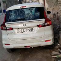 سيارة سوزوكي إرتيجا للبيع، لون أبيض بحالة ممتازة مثل الجديد، استعمال خ...