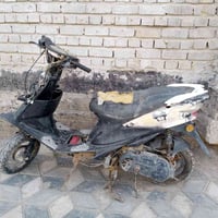 دراجة نارية • كوم حديد