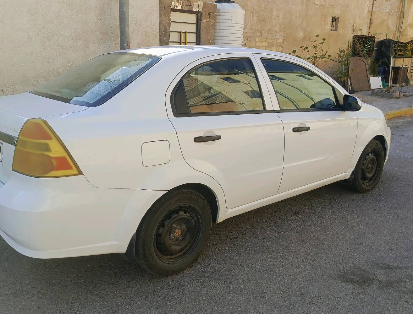 سياره افيو موديل ٢٠١١ كير محرك حداديه نص عمر  تخم تاير رقم بصره بسمي السياره ٦٩ والاستفسار ٠٧٠٣٠٦٢٤٥٨