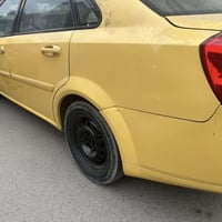 أوبترا 2011 سياره  حلوه بيها فقط جملغ خلفي باقي جاهزه سعر 64وبيها مجال...