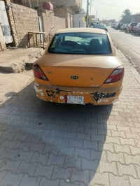 كيه ريو للبيع موديل ٢٠٠٣ رقم بغداد راعيه موجود شرط مداور عليه هيءه غرا...