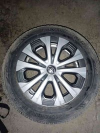 البيع اربع تايرات سياره كورلا هايبرد 2022 مع ويلكاب اصلي  تايرات زوج ن...