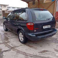 ودج كرفان 2007 رقم جديد كوبون بانزين  شرط التحويل  مكينة وكير شرط 4 قط...